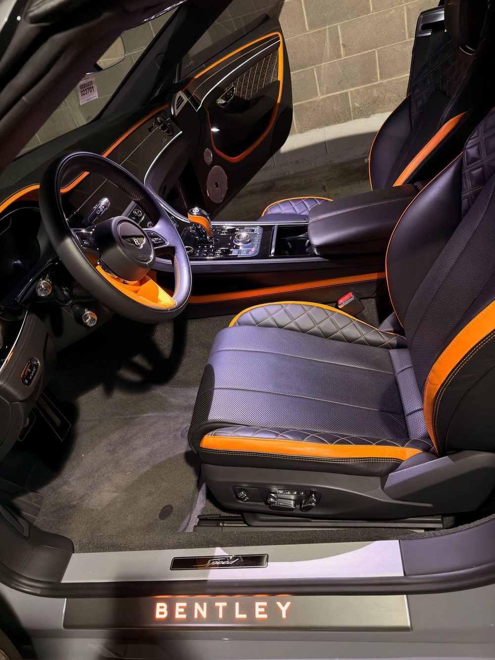 Bentley interior before detailing — dusty floors and console