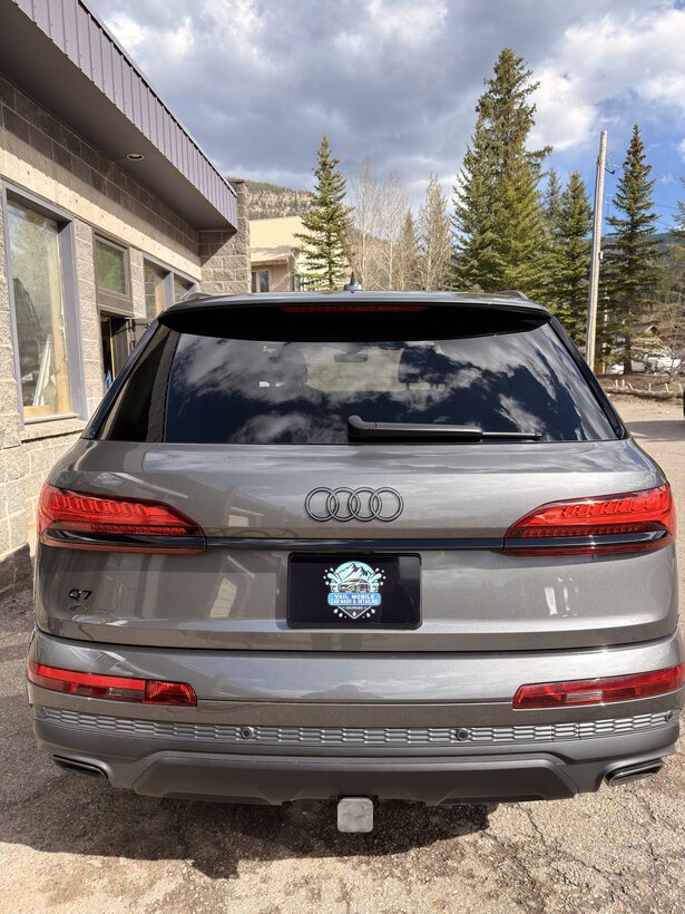 Grey Audi Q7 SUV detailed in the Vail mountains