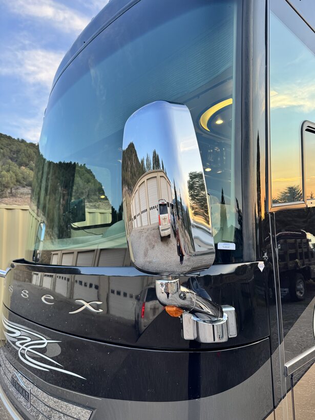 Chrome coach mirror polished to a shine