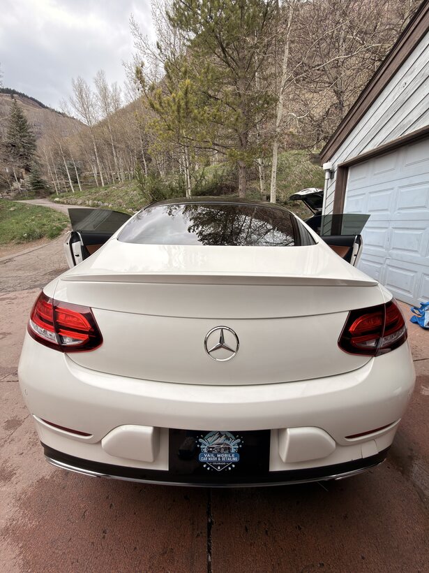 White Mercedes-Benz coupe detailed in Vail