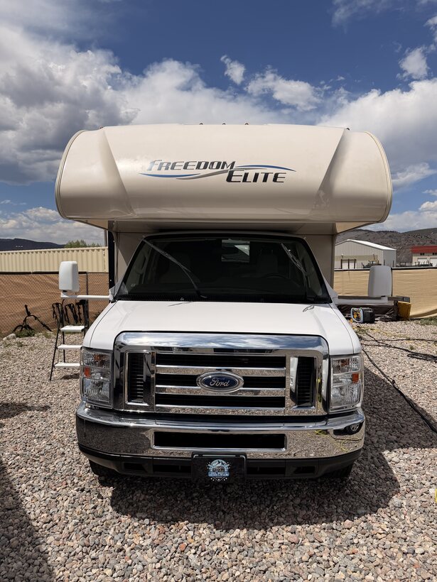 Class C motorhome washed under Colorado skies